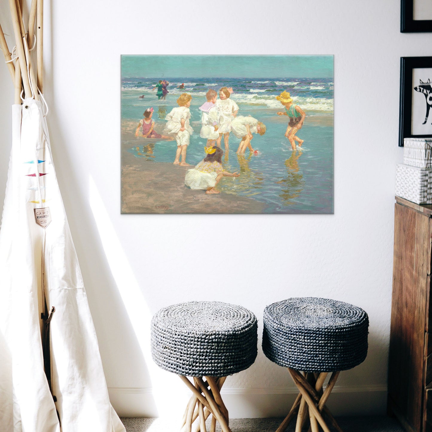 Wonderful vintage oil painting artwork done by Edward Henry Potthast . Children play in the sand at a beach in their old fashioned swimwear. Bold colors and details. Done as a Print on Canvas. Ready to Hang. Displayed in a childs room above two grey benches.