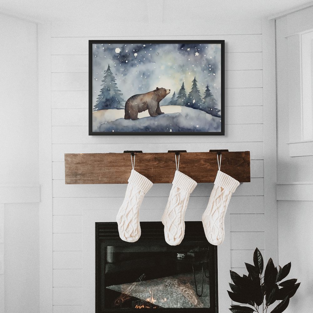Framed artwork of a bear in a snowy landscape above a fireplace with stockings hanging.