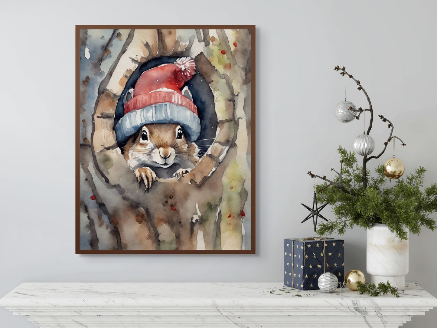 Framed artwork of a squirrel wearing a hat on a wall with decorative items below.