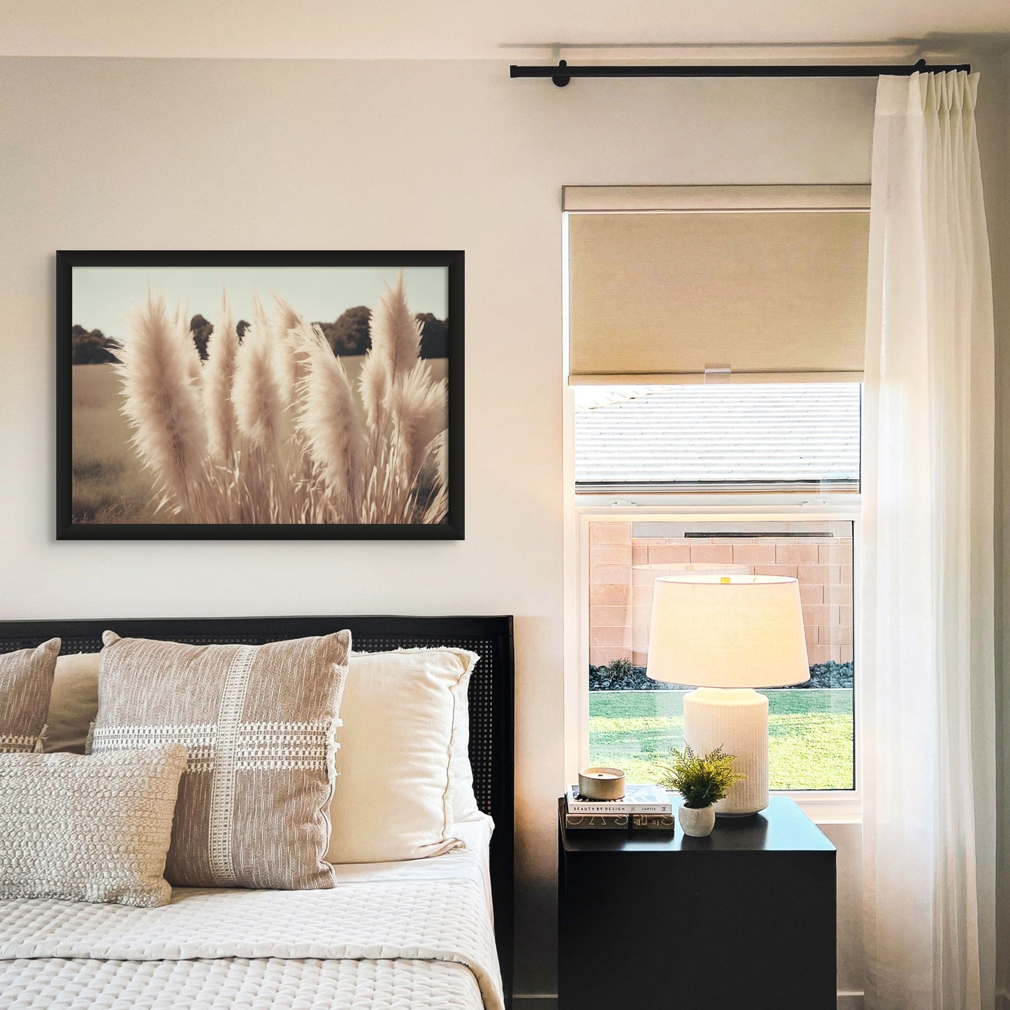 A unique photograph print on canvas of soft and fluffy pampas grass by a wheat field. A calm and serene landscape. Neutral colors match with neutral rooms.