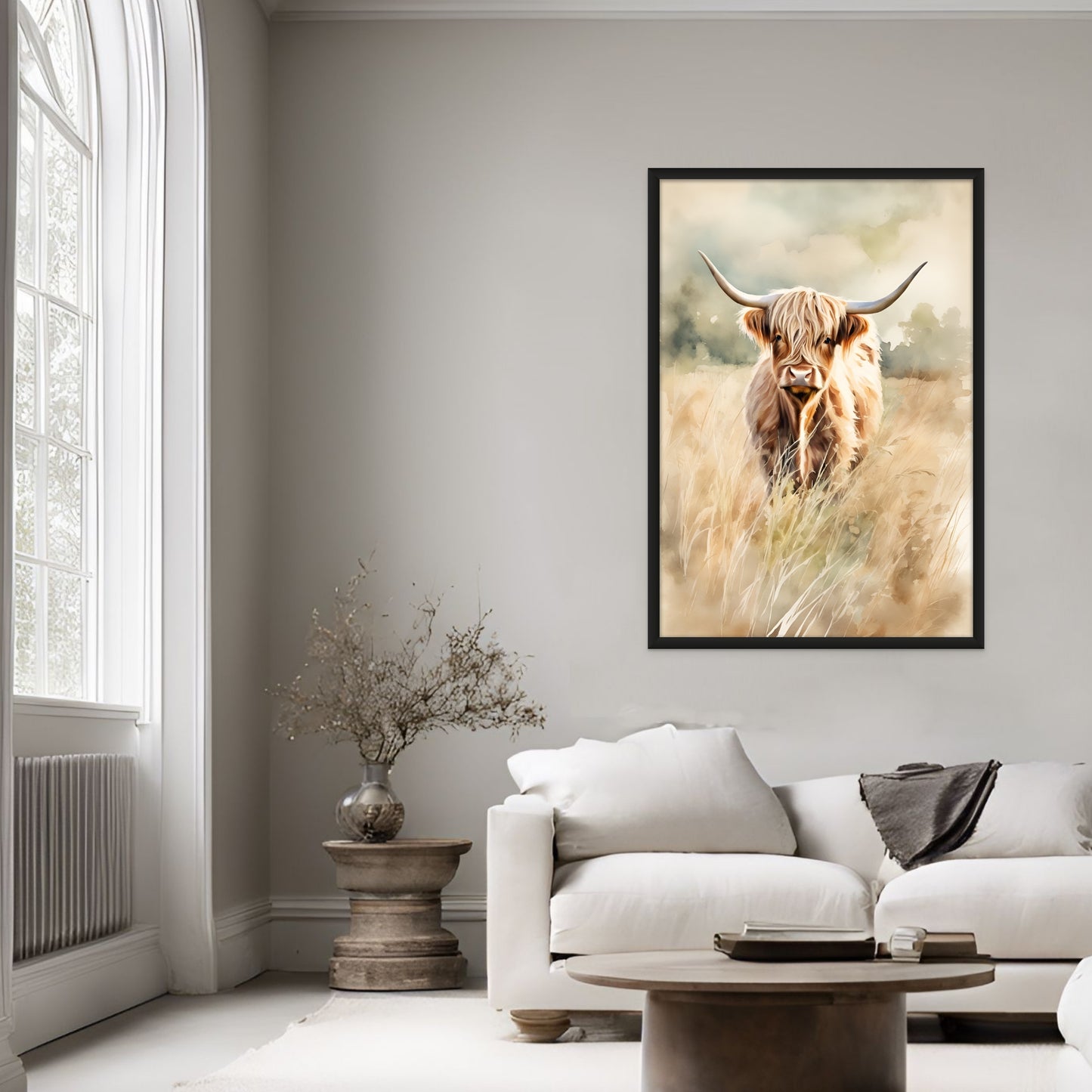 highland cow standing in the tall grass in light colors