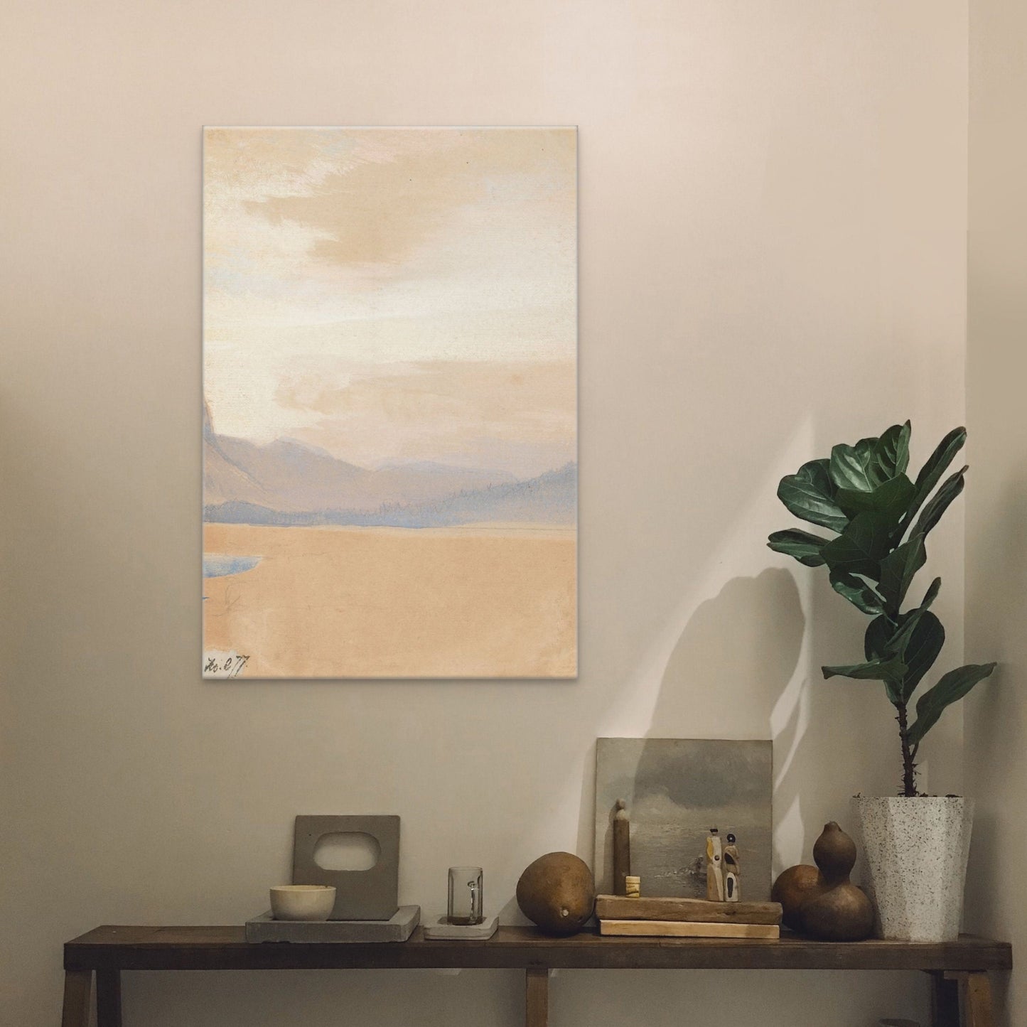 vintage painting with soft and neutral colours with a touch of soft blue of American Plains. Made by Thomas Moran in 1892 displayed above an entry way bench