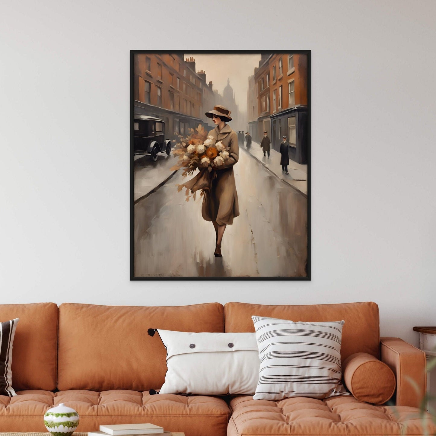 Autumn colors displayed in a romantic scene of a young woman in the 20s holding a bouquet displayed above and orange couch