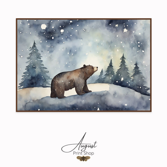 Framed artwork of a bear in a snowy landscape with trees and a starry sky, signed 'August Print Shop'.