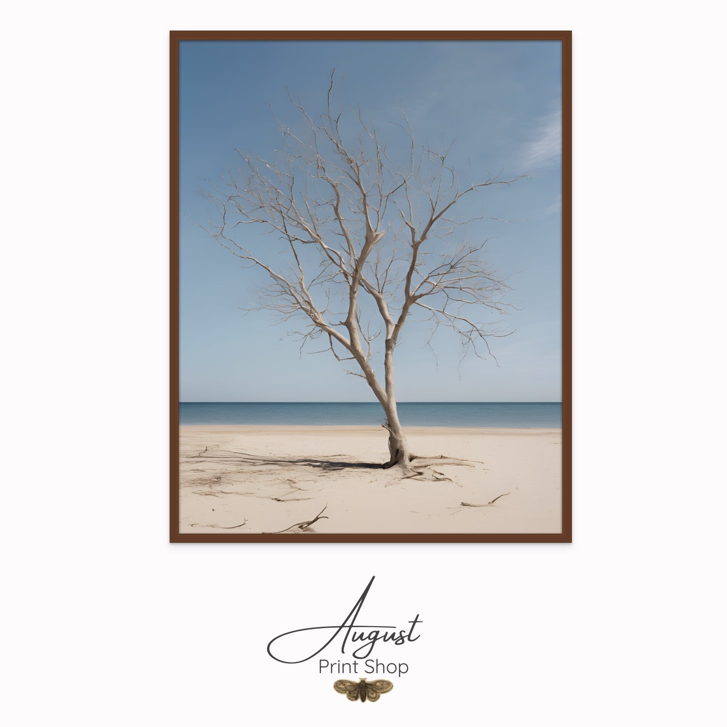 photograph print on canvas of leafless tree in the middle of a sunny, calm beach. Featuring soft blues ad beige neutrals.