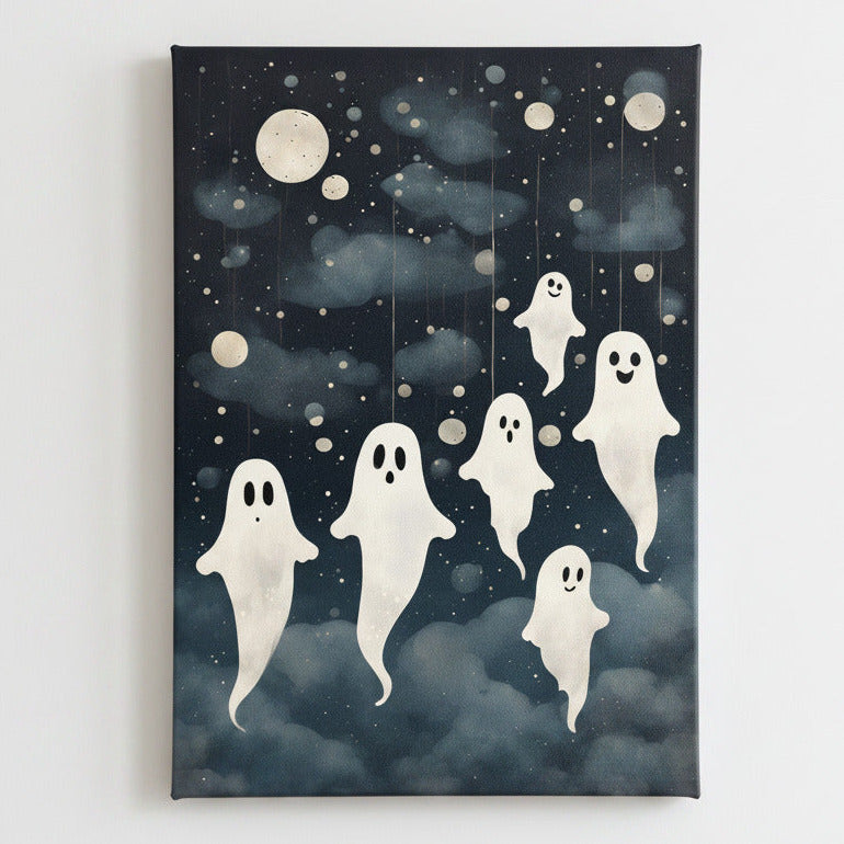 Canvas print with ghost illustrations against a night sky with moons and stars on a white background