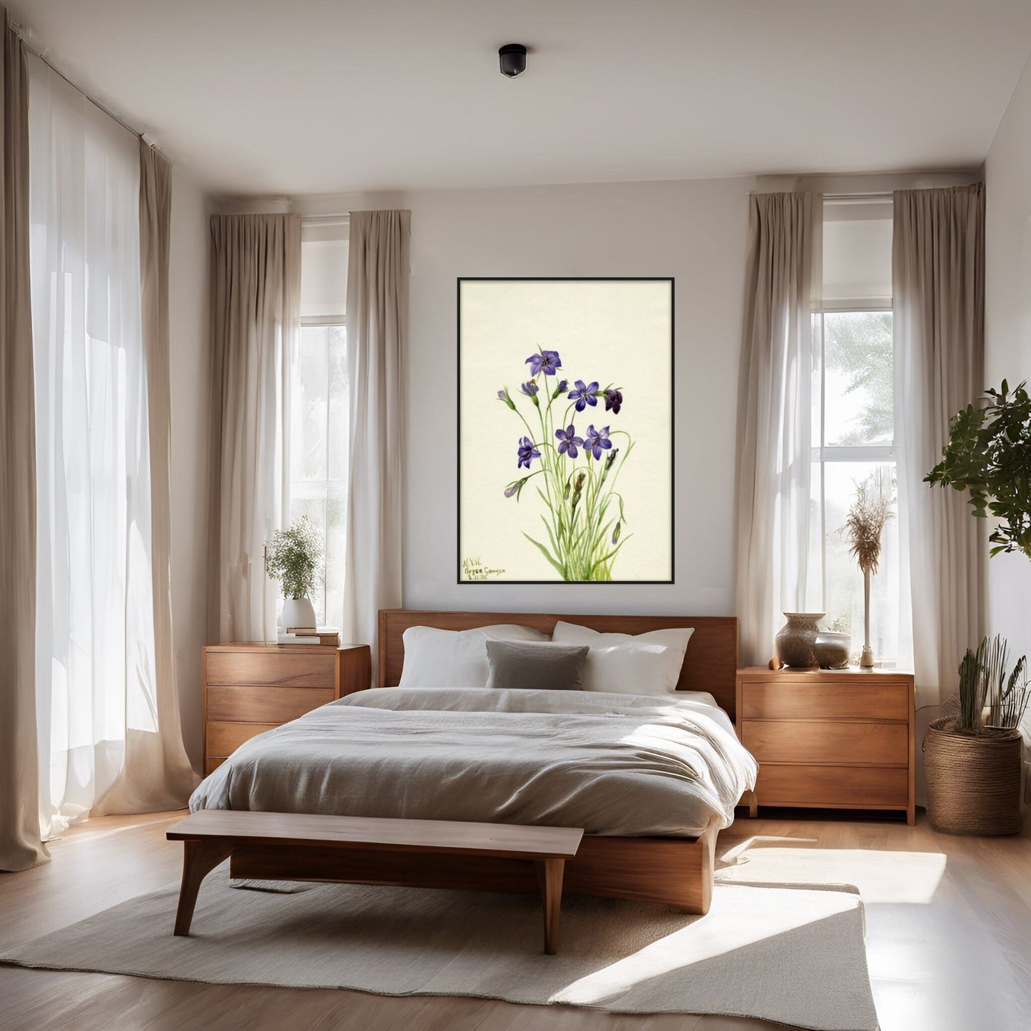 Bellflower artwork displayed above a wood bed with white linen