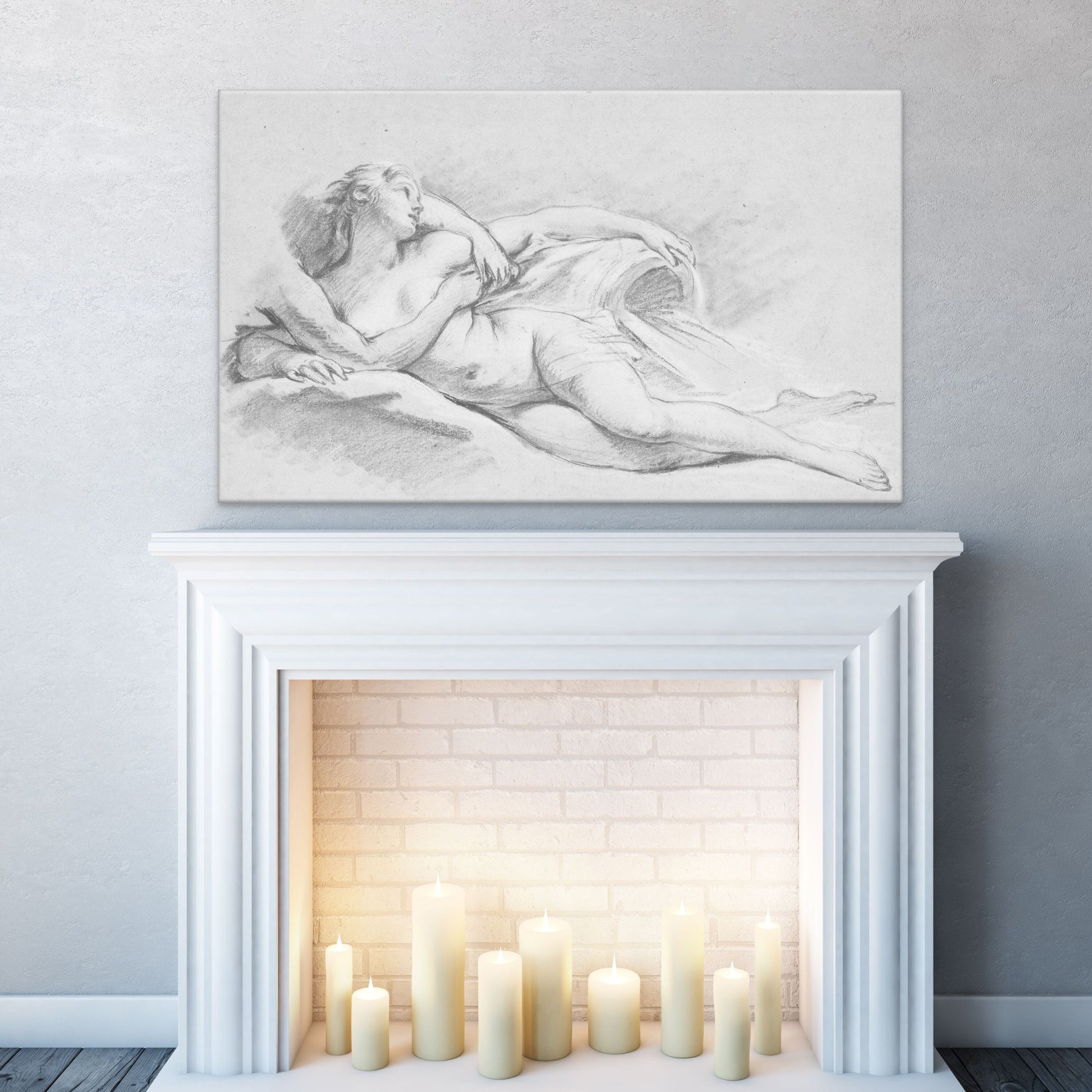 A unique vintage pencil sketch of a woman in soft grey pencil laying naked. Her body covered by an arm. White background.. Classic 1800s sketch artwork. Artwork being displayed over a white fireplace.